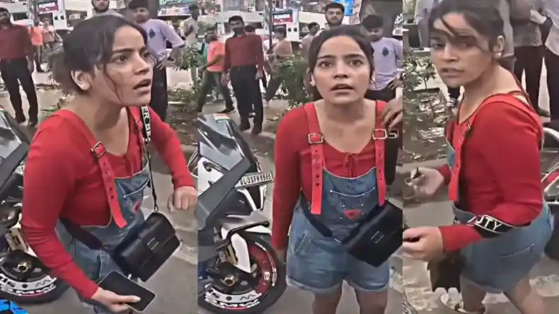 VIDEO: बीच सड़क पर अचानक कपड़े उतारने लगी महिला, नजारा देख लोग हुए हैरान, वीडियो वायरल